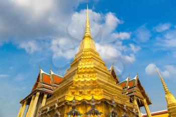Grand Palace and Wat Phra Kaew (Temple of the Emerald Buddha) in Bangkok in a summer day