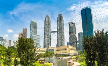 Panorama of Petronas Towers is the tallest buildings in Kuala Lumpur, Malaysia at summer day