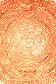 Brick dome inside. Dome is made of red brick. Circular brickwork.