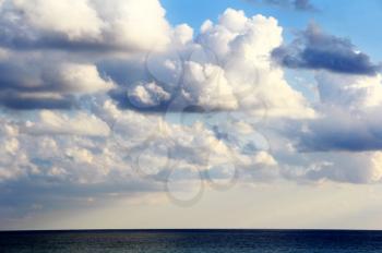Scenery with calm sea and fluffy sky
