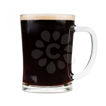 Glass mug filled with dark stout beer