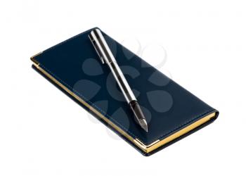 Agenda. Scheduling. Organizer and fountain pen. Closeup shot, shallow DOF, isolated on white