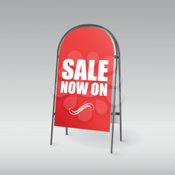 Pavement sign with the text, red letters, sale now on