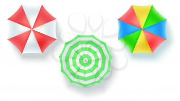 Set of beach sun umbrellas isolated on white background, top view. Vector icons in Flat lay position, 3D illustration. Three striped and multi colored umbrellas