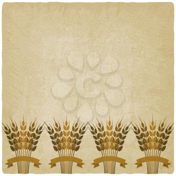 Golden sheafs of wheat with ribbons on vintage background. vector illustration - eps 10