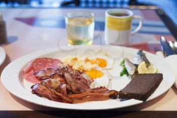 white plate with hotel full English breakfast