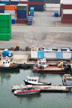 boats and freight containers in cargo port , Copenhagen