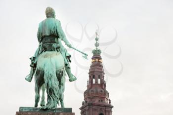 view on Christiansborg palace tower and Statue of Absalon in Copenhagen, Denmark 