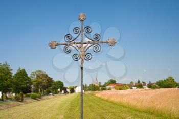 old cross in wheat field near Basilique Notre-Dame de l'Epine