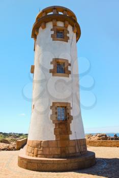 lighthouse in Brittany on Pink Granite Coast in France