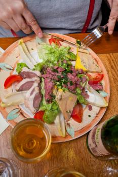 lunch in Normandy with big salad with foie gras cider
