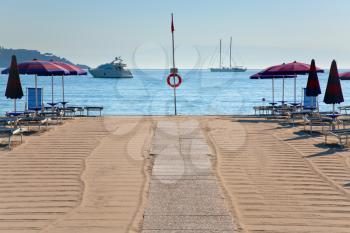sand beach in Giardini Naxos (seaside town in Sicily) in morning