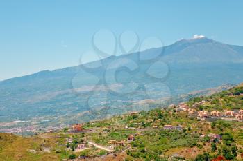 view on Etna and agricultural gardens on sicilian hills