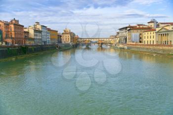 view on Ponte Vecchio in Florence in sunny evening