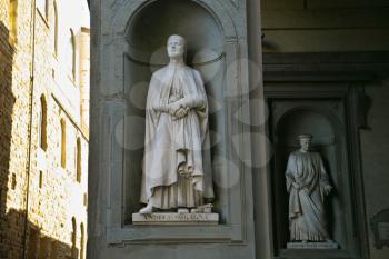 FLORENCE, ITALY - JANUARY 12: Statues of Andrea Obgagna and Pater Cosimo in Uffizi art museum on January 19, 2009 in Florence, Italy