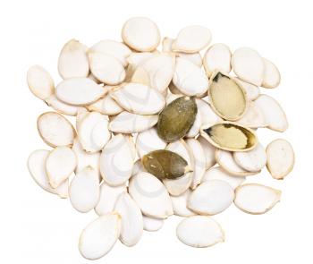 heap of pumpkin seeds isolated on white background