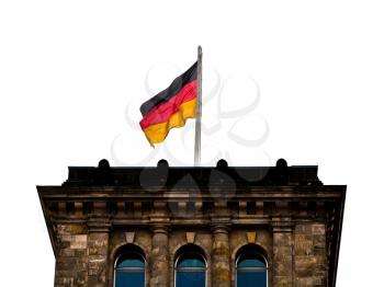 Flag of Germany over Reichstag building tower in Berlin