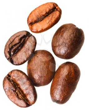 several roasted coffee beans isolated on white background