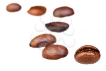 curve line pattern from roasted coffee beans with focus foreground