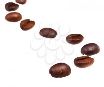winding line pattern from roasted coffee beans with focus foreground