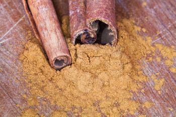 sticks and powdered Cinnamon close up