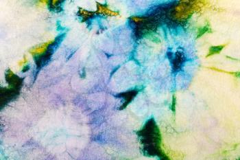 abstract floral pattern of cold painted batik on tulle