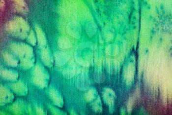 abstract stained pattern of salting green painted batik