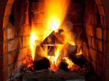 fire in fireplace in evening time