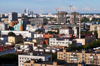 urban view with buildings under construction in Moscow in summer afternoon