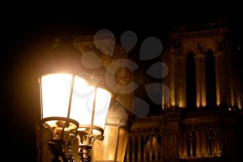 Lamps near Notre Dame de Paris at night