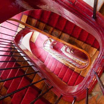 wooden spiral steps in old house in Paris