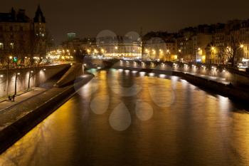 Seine river and quay in Paris at night