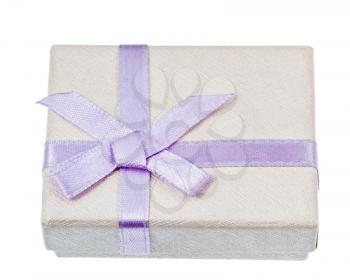 small white gift box with lilac bow isolated on white background
