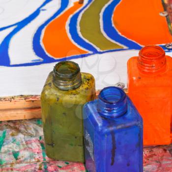 bottles with dyes for cold batik painting