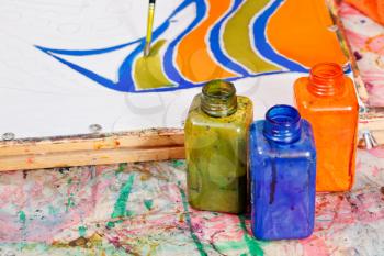 painting and bottles with dyes for cold batik painting