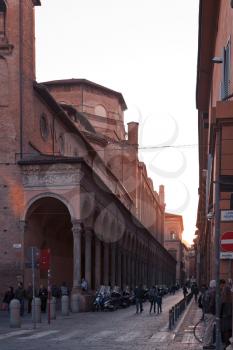 ancient urban fortified circle wall of Torresotti (cerchia dei torresotti) and view on church San Giacomo Maggiore from Via Zamboni in Bologna, Italy