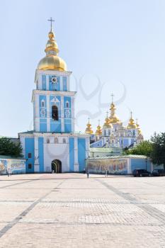 St. Michael's Golden-Domed Monastery with cathedral and bell tower seen in front of St. Michael's Square in Kiev, Ukraine