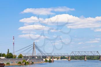 cloudscape under Podilskyi Railroad Bridge on Dnieper River in Kiev, Ukraine