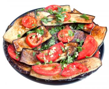 fried eggplants, red tomato and garlic on black plate isolated with white background