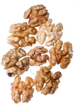 several peeled walnut kernels isolated on white background
