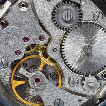 steell clockwork of wristwatch with gears, spring close up