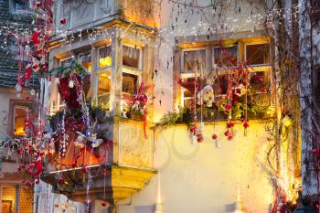 urban houses with christmas decoration at night