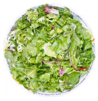 top view of fresh italian lettuce mix in bowl isolated on white background