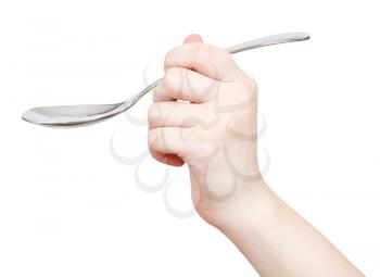 hand with tablespoon isolated on white background