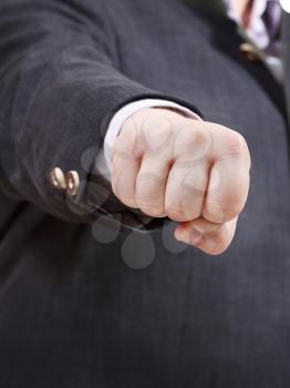 front view of clenched fist of businessman - hand gesture