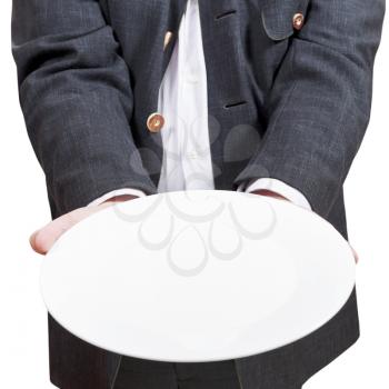 front view of businessman holds empty white plate isolated on white background