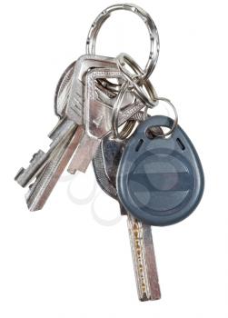 bunch of keys on steel ring and magnetic key isolated on white background