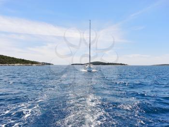 view of white yacht in blue Adriatic sea, Dalmatia, Croatia