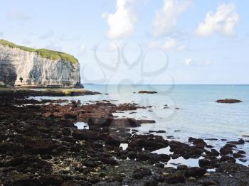 stone beach and cape on english channel Etretat cote d'albatre, France