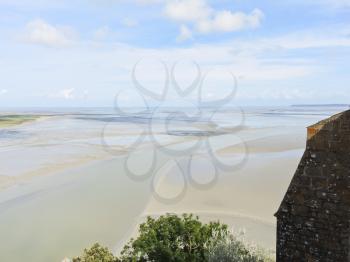 landscape with tidal bay of English channel at low tide from mont saint-michel abbey, Normandy